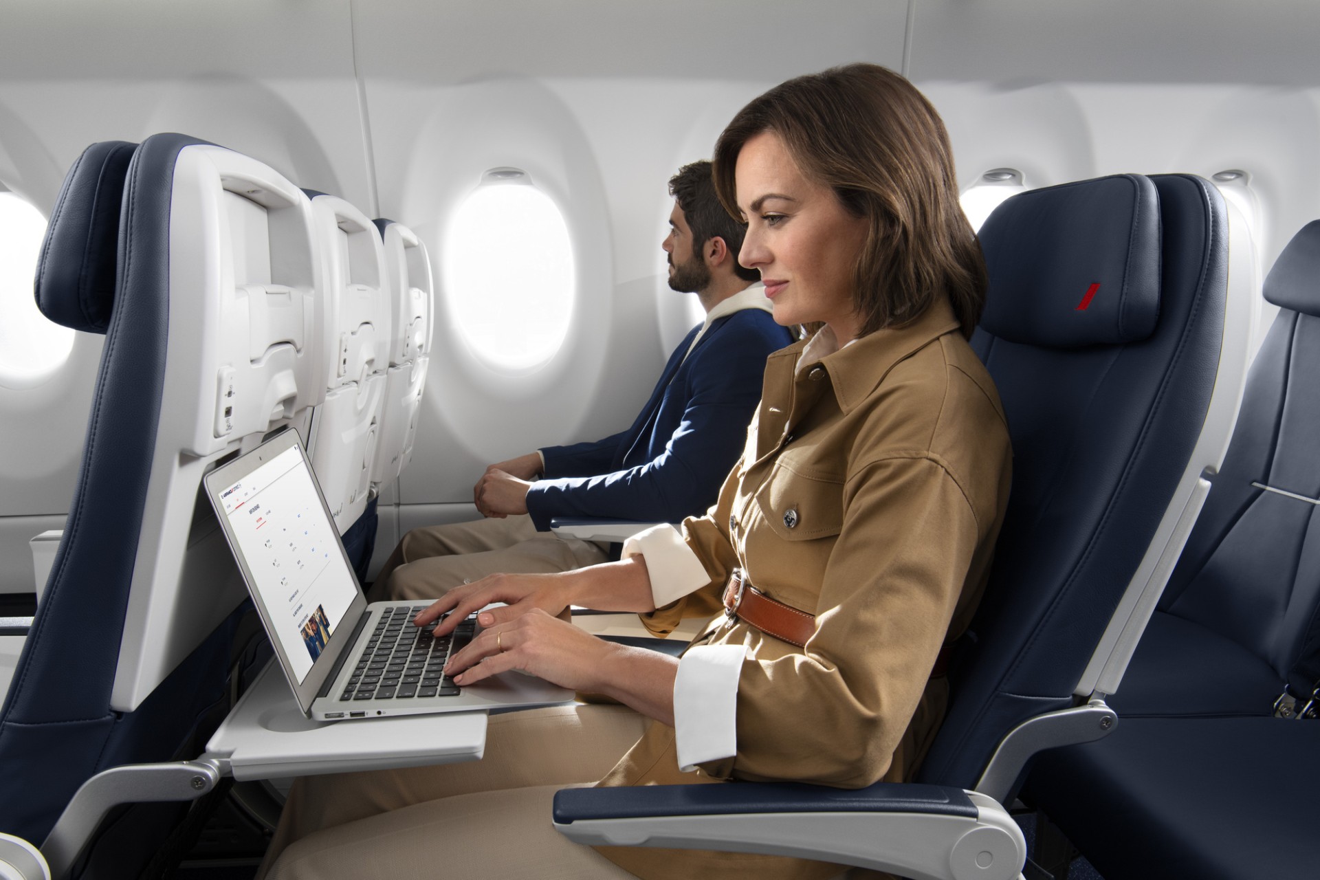 Femme sur un fauteuil A320