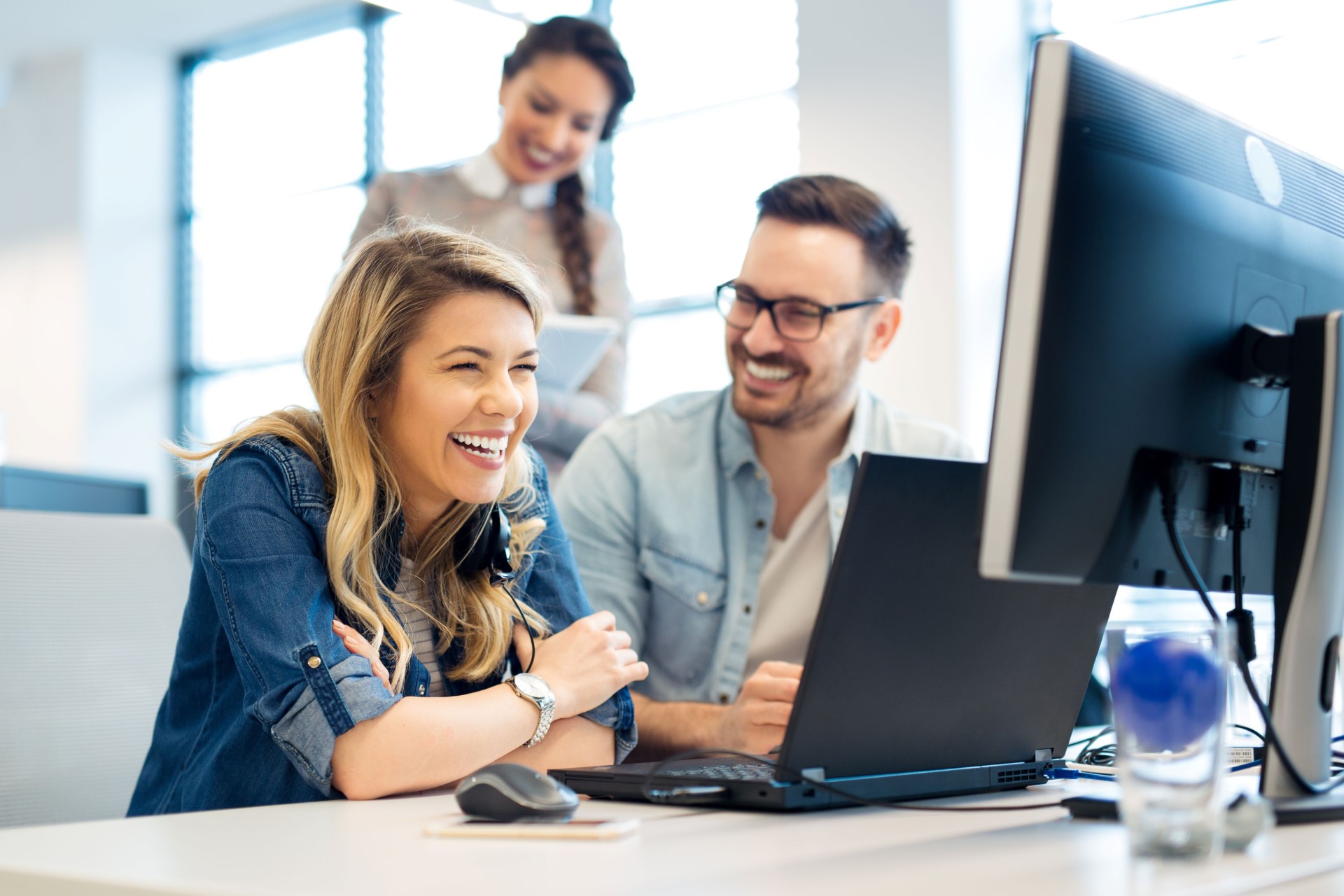 Employees on a computer
