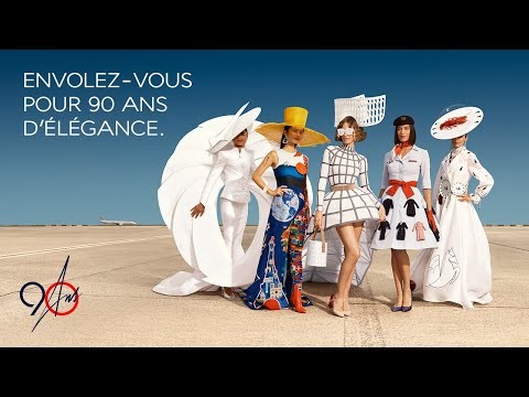 A photo that shows 5 elegant girls in white dresses in an Aéroport