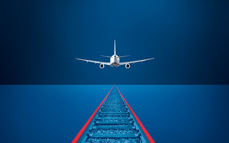 Illustration avion au dessus d'un rail